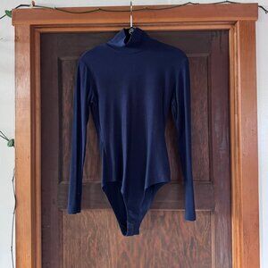 Reformation Lozita ribbed turtleneck bodysuit in navy